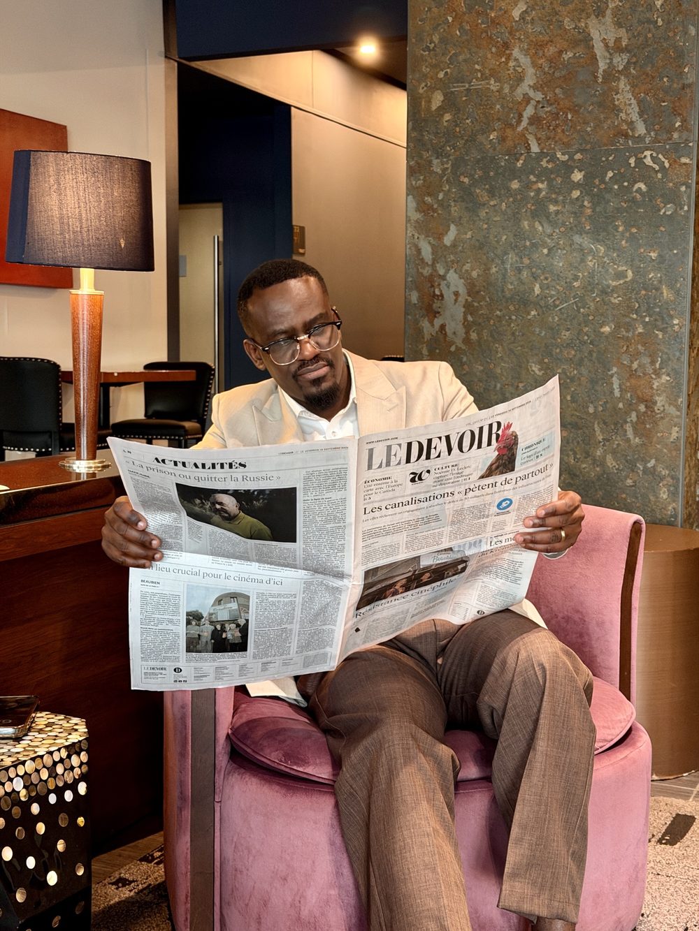 Jean reading the newspaper
